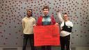 From left, Marshall Everett, Ed Peters, and Sabrina Herb protest the cuts to campus mental health services at HACC, Central Pennsylvania's Community College, on Oct. 23, 2019.