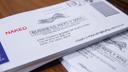 "Naked" ballots are stacked and sorted inside a secure facility within the Erie County Courthouse.