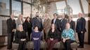 Some trustees of the Pennsylvania public school pension system, PSERS, pose with executive director Glen Grell (right) at the $60 billion-asset agency's Harrisburg office tower in 2020. Chairman Chris Santa Maria, a Harriton High School social studies teacher, is at center.