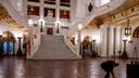 Robert Turner cleans the Moravian tiled floor after hours in the rotunda of the Pennsylvania Capitol in Harrisburg.