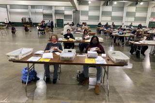 About 100 county employees processed mail-in ballots at the York Fairgrounds on Tuesday.