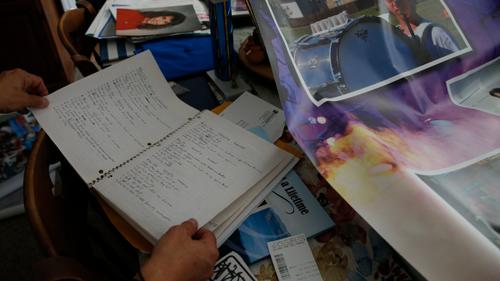 Susan Ousterman, mother of Tyler Cordeiro, flips through her son’s journals